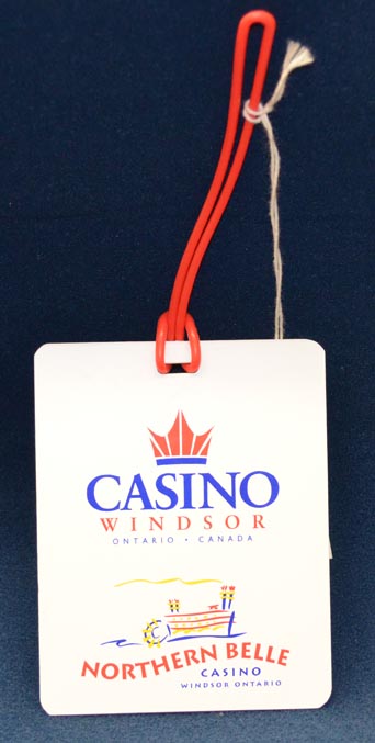 a%20luggage%20tag%20from%20the%20Northern%20Belle%20Casino%20with%20a%20white%20background%20colour%20and%20Casino%20Windsor%20logo%20in%20blue%20and%20red%20on%20top%20and%20Northern%20Bell%20Casino%20logo%20on%20bottom